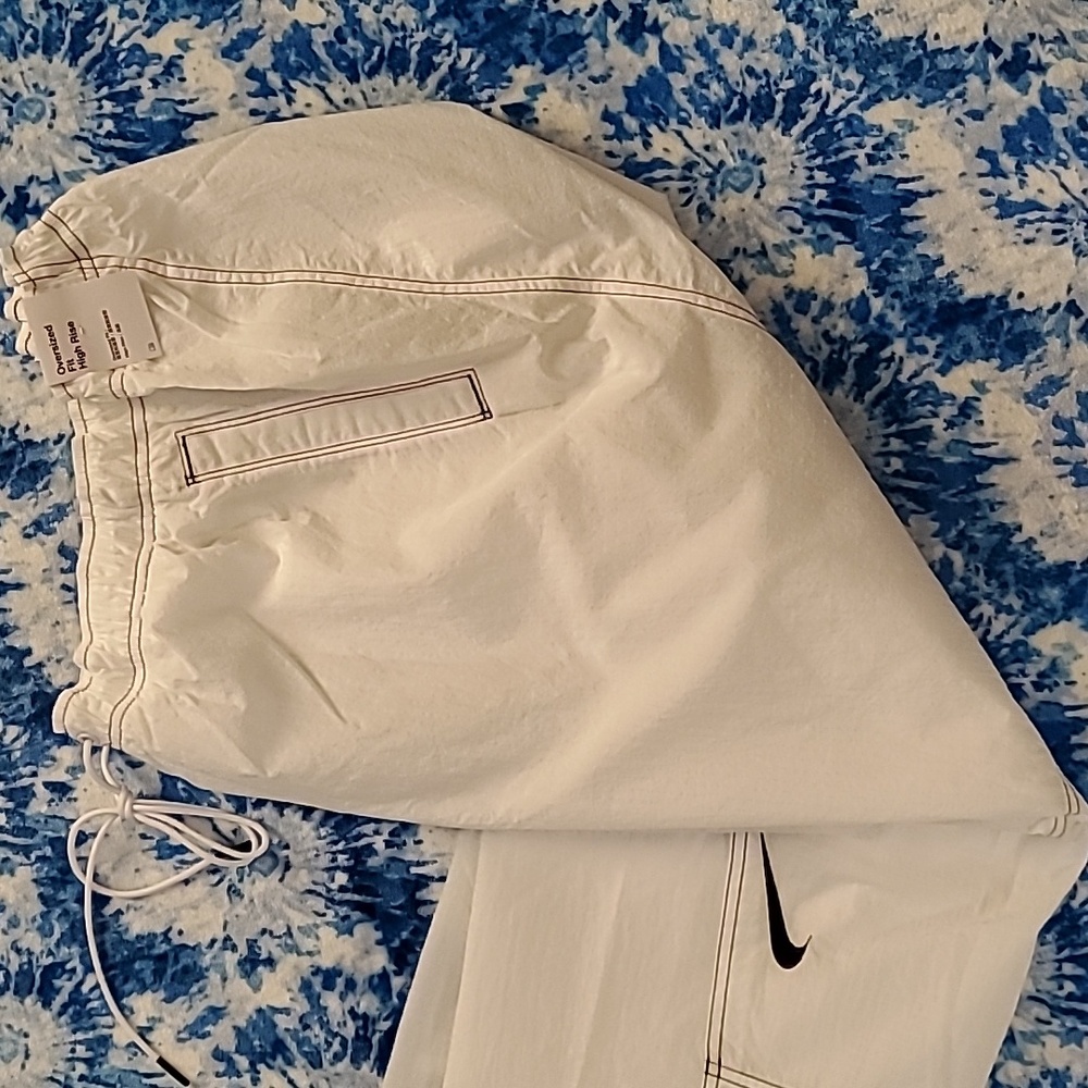 NIKE REPEL OVERSIZED HIGH RISE LOOSE PANTS. SIZE XL
